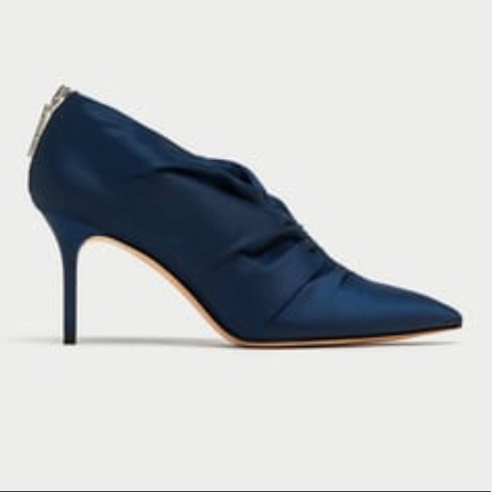 High heel ankle booties with gathered detail.
